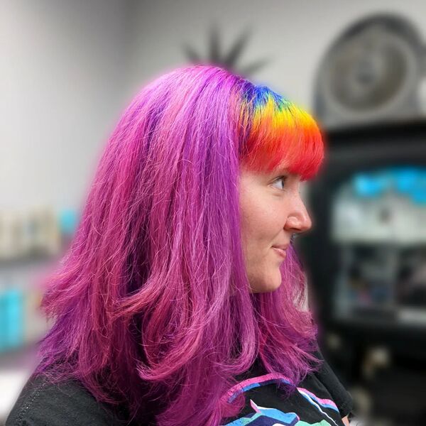 Shoulder Length Hair Bangs - A woman wearing a black shirt
