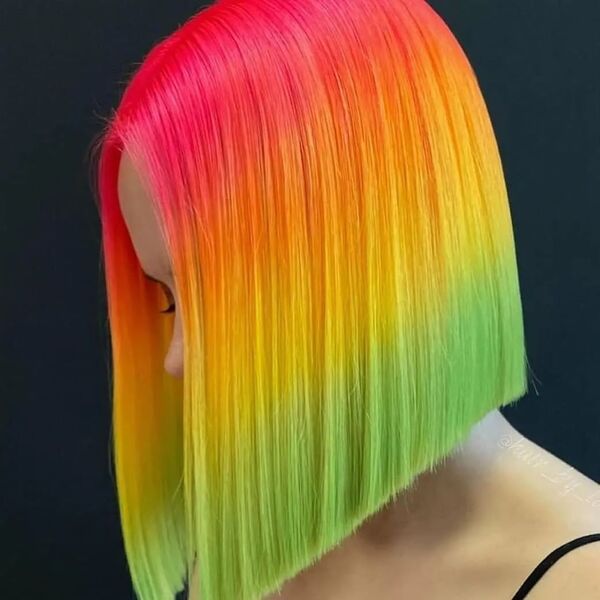 Straight and Short Rainbow Hair - A woman wearing a black spaghetti strap
