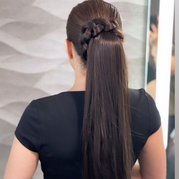 Wrap Hairdos  - A woman wearing a black blouse