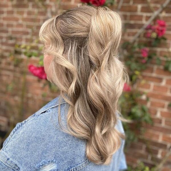 Clip Half Up with Parted Bangs - a woman wearing blue denim jacket